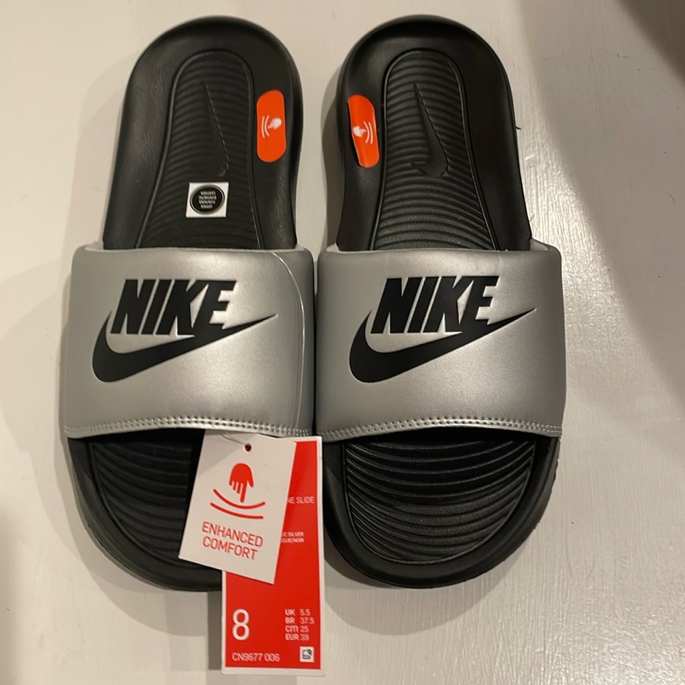 Nike Slides Size 8.  Brand new with tags